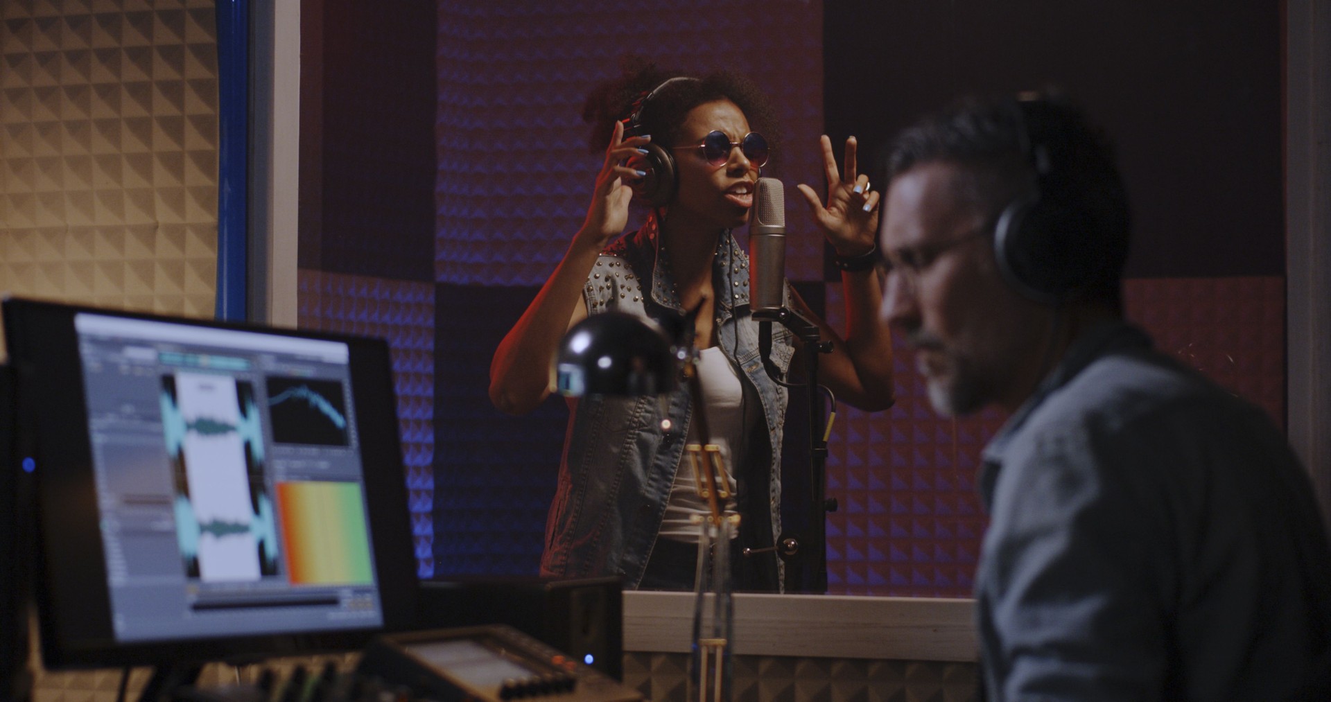 Vocalist and sound engineer working in studio