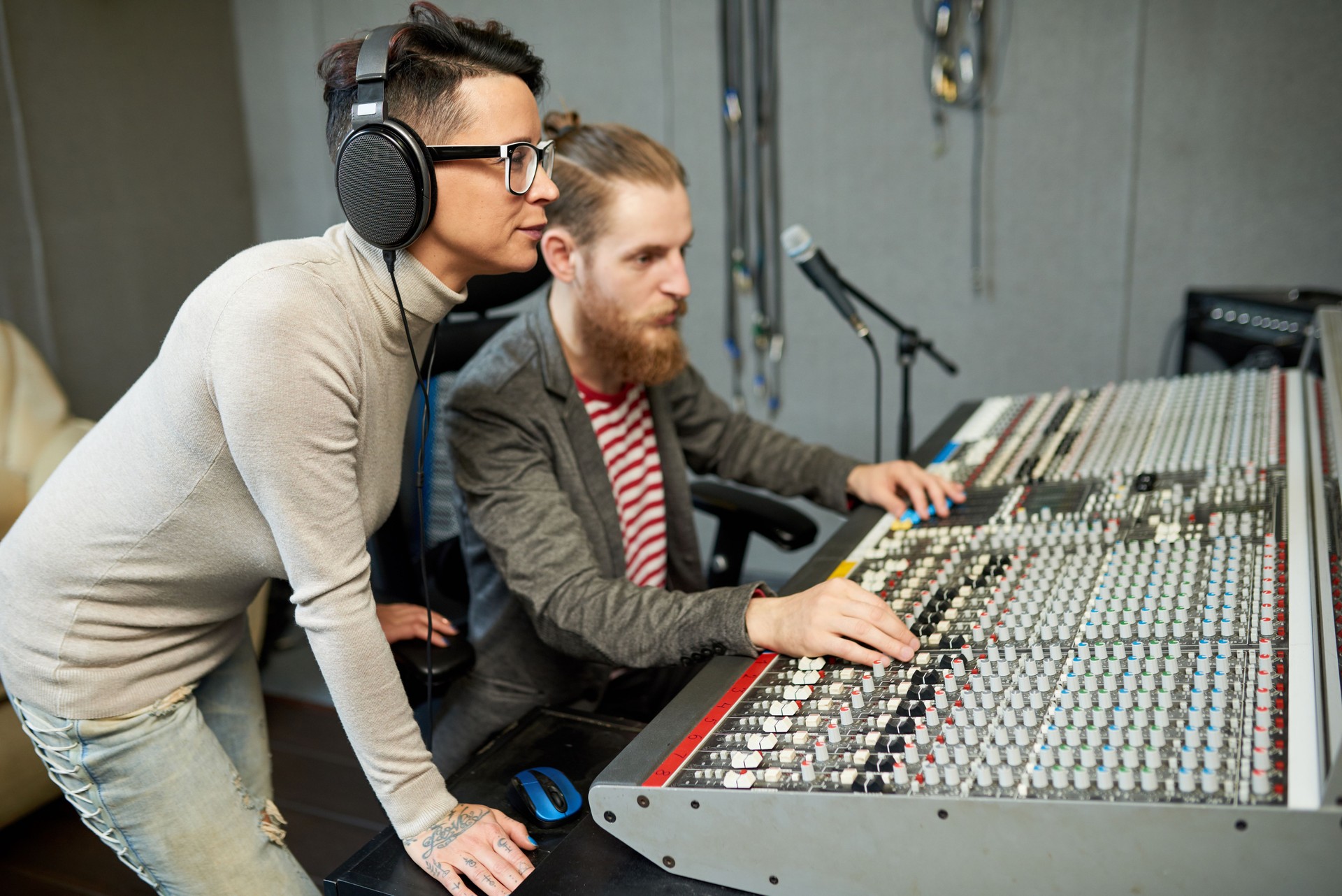Coworkers in process of creating music